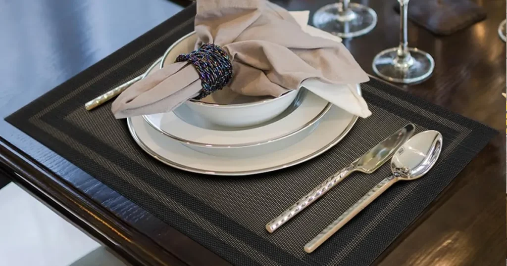 Why are PVC placemats still the preferred choice in the catering industry